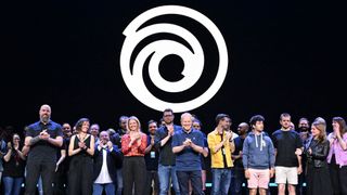 Ubisoft CEO Yves Guillemot (C) is joined by members of the Ubistoft team on stage at the Ubisoft Forward 2024 showcase presentation at the Belasco Theater in Los Angeles, California on June 10, 2024.