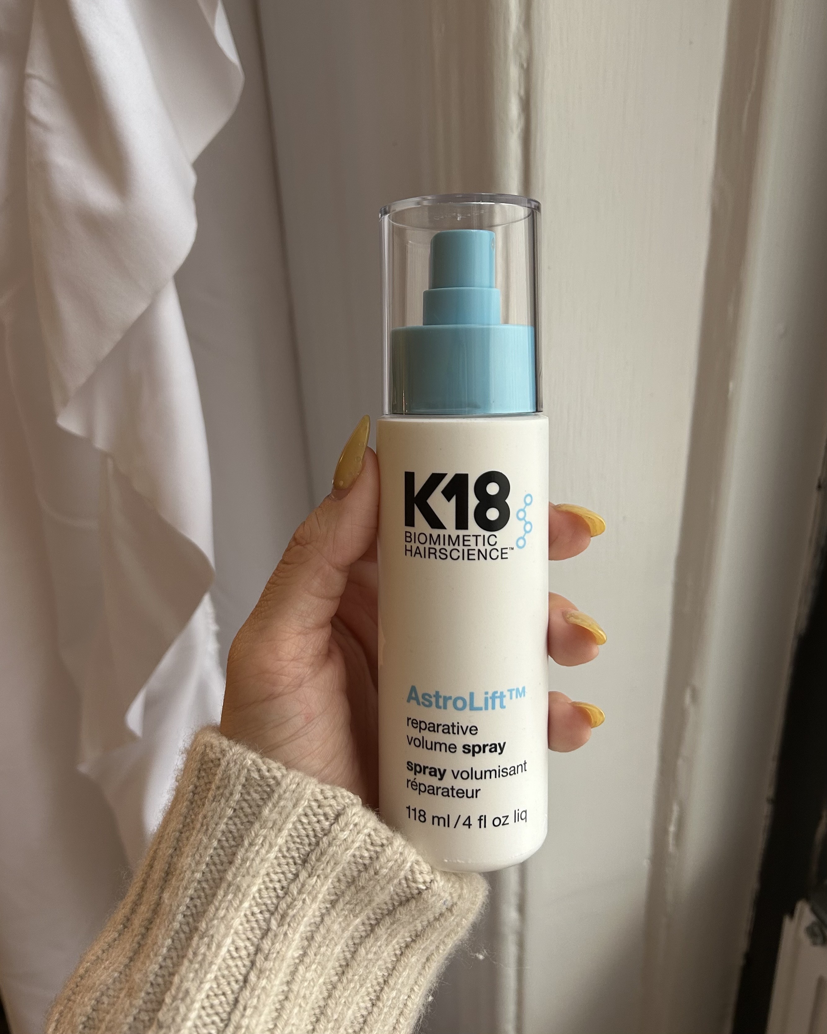 An image of the K18 AstroLift Reparative Volume Spray by Alyssa Brascia.