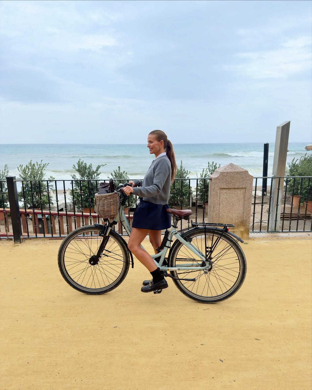 JANKA POLLIANI wears micro mini skirt on bike