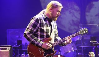 Derek Trucks performs onstage with the Tedeschi Trucks Band at the Ryman Auditorium in Nashville, Tennessee on February 23, 2023