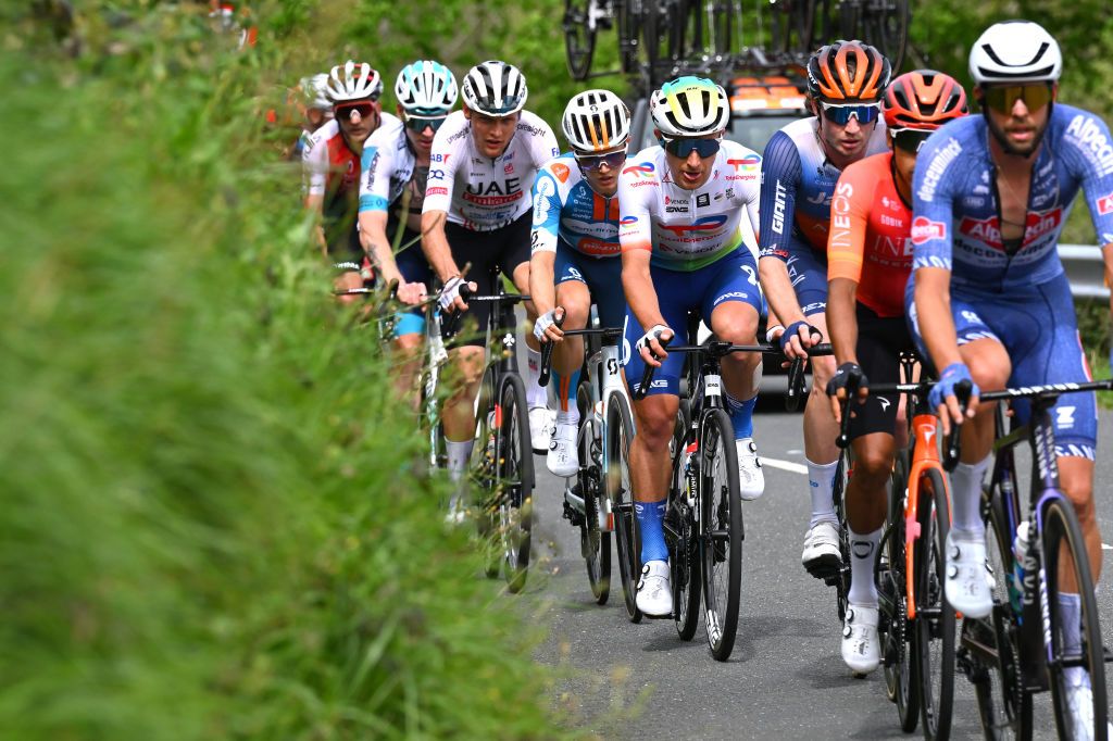EIBAR SPAIN APRIL 06 LR Oscar Onley of The United Kingdom and Team dsmfirmenich PostNL and Fabien Doubey of France and Team TotalEnergies compete in the breakaway during the 63rd Itzulia Basque Country 2024 Stage 6 a 1378km stage from Eibar to Eibar UCIWT on April 06 2024 in Eibar Spain Photo by Tim de WaeleGetty Images