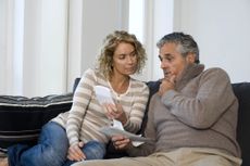 Older couple budgeting 