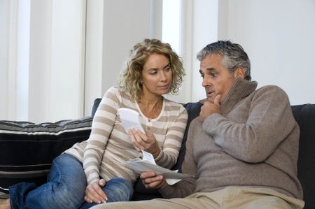 Older couple budgeting 