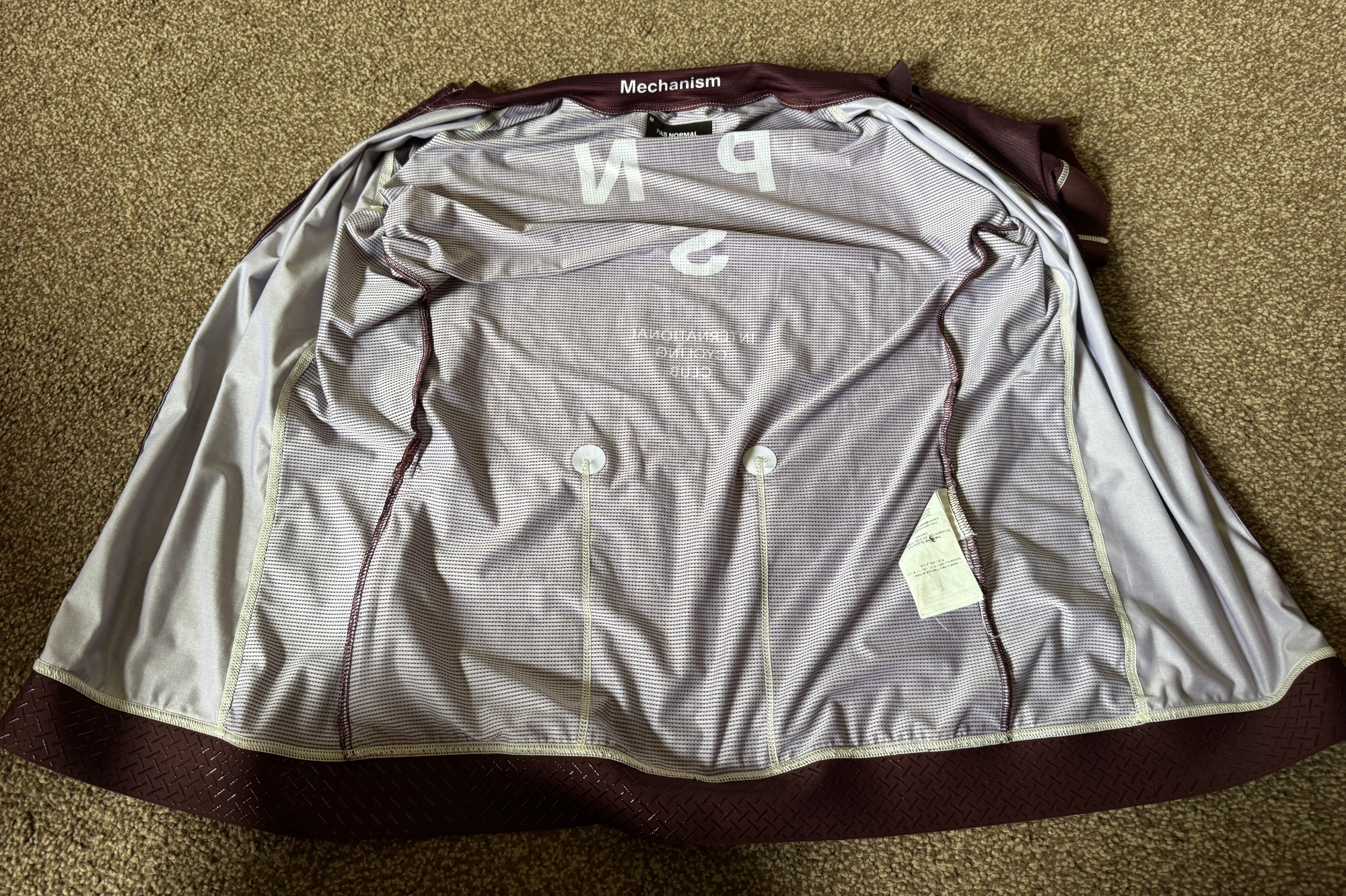 The inside of the PNS Mechanism jersey 2025