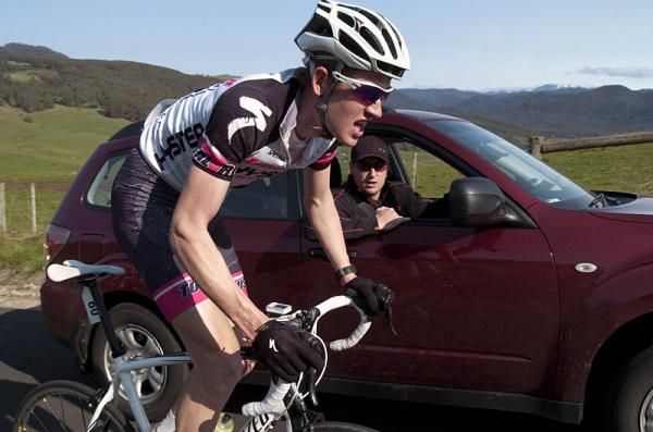 Michael Crosbie (Hyster-Total Rush) receives some encouragement from his team manager on the climb at Gunns Plains.