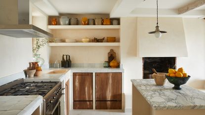 Rustic Provencal-style wooden kitchen in 16th century French townhouse in Saint-Paul de Vence