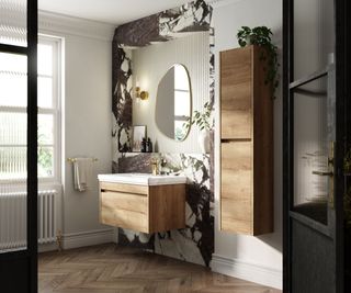 Bathroom with a floating wood vanity with a marble countertop