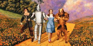 The Wizard of Oz Dorothy Scarecrow Lion Tin Man on yellow brick road