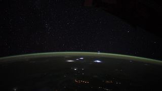 Thunderstorms lighting up the night sky over eastern Africa photographed from the International Space Station.