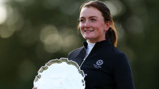 Charlotte Heath poses with the Smyth Salver after finishing as low amateur at the 2023 AIG Women's Open at Walton Heath