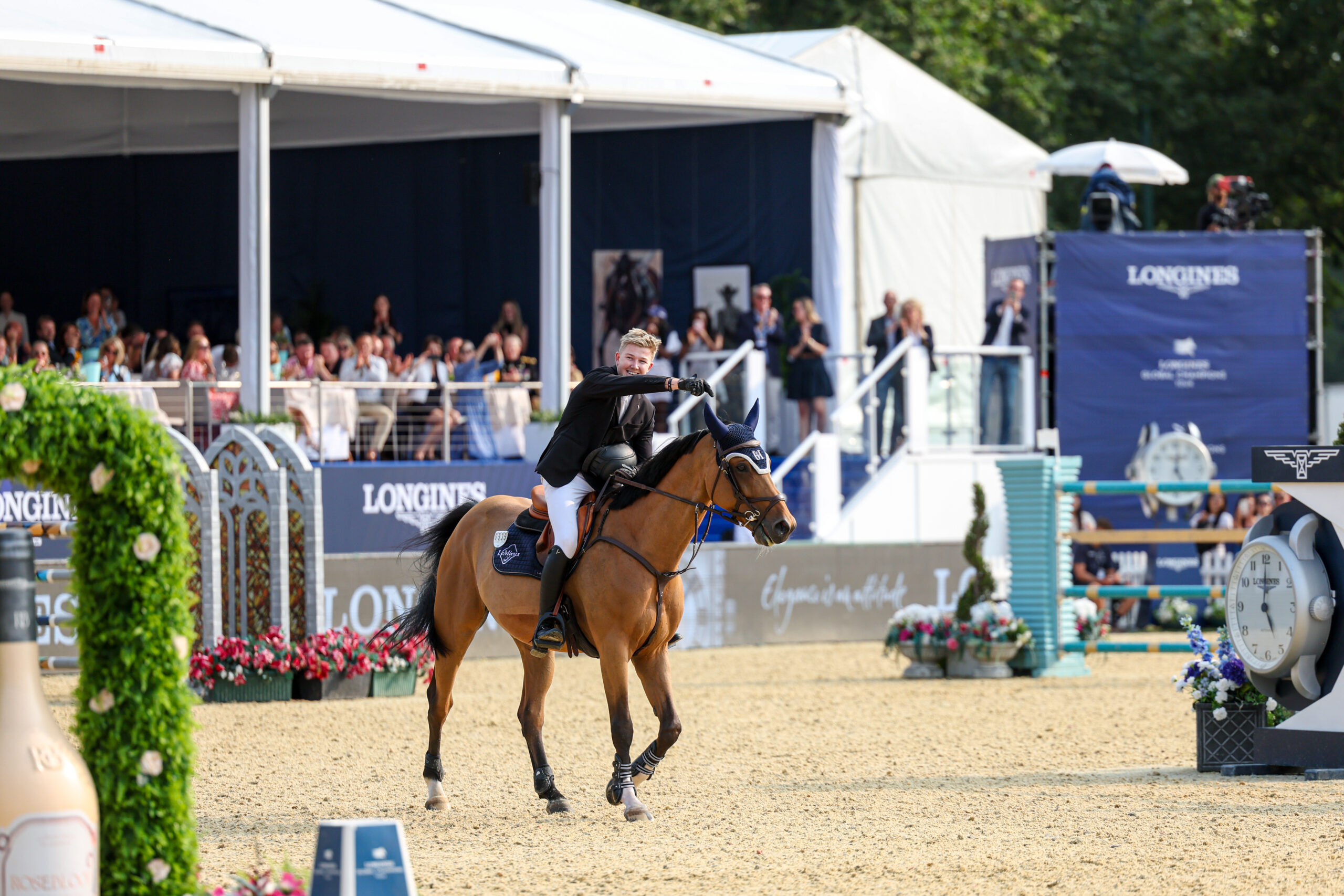 Harry Charles acknowledges the brilliant Sherlock after jumping clear in the LGCT grand prix of London.