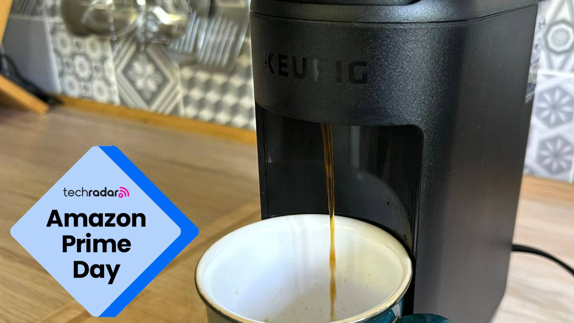 The Keurig K-Mini Mate machine pouring a cup of coffee