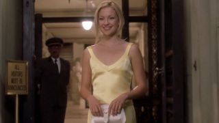 Kate Hudson's Andie showing off her yellow-gold dress to Benjamin in How to Lose a Guy in Ten Days.