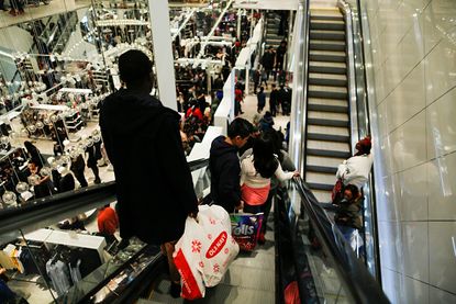 Shoppers visit H&M in New York on Black Friday.