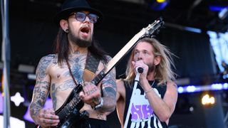 Guitarist Dave Navarro of Jane&#039;s Addiction and Taylor Hawkins of Foo Fighters perform onstage with their new band NHC during day 2 of the Ohana Festival Encore weekend on October 02, 2021 in Dana Point, California.