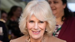 Queen Camilla leaves after a visit to a women's refuge on January 22, 2024