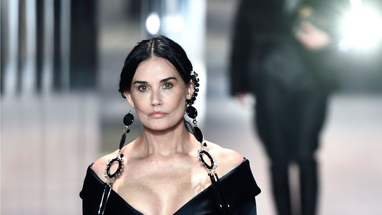 US actress Demi Moore presents a creation of British designer Kim Jones for the Fendi's Spring-Summer 2021 collection during the Paris Haute Couture Fashion Week, in Paris, on January 27, 2021. - British designer Kim Jones presents his first ever Couture Collection for Fendi since he joinded Italian fashion house Fendi as its lead designer for womenswear in September 2020 (Photo by STEPHANE DE SAKUTIN / AFP) (Photo by STEPHANE DE SAKUTIN/AFP via Getty Images)