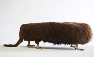The bench also sports a Buffalo fur tail but is puzzlingly missing a head