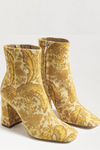 yellow tapestry-patterned ankle boots