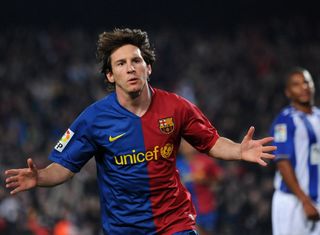 Lionel Messi celebrates after scoring for Barcelona against Malaga in 2009.
