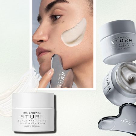 a woman using a gua sha next to the barbara sturm super antiaging face mask rich