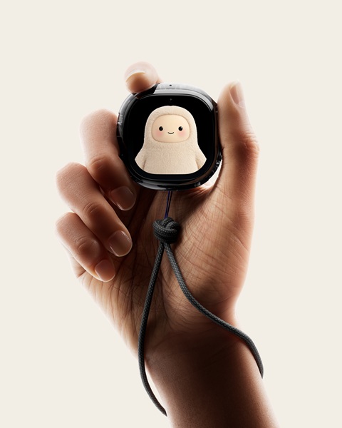 The Meta Muse Charm with a wrist strap, and a 2-inch OLED display with a small avatar.