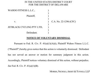 A court case document showing the voluntary dismissal of a case