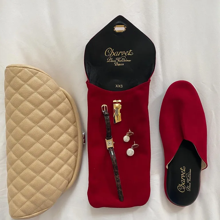 a pair of red Charvet slippers