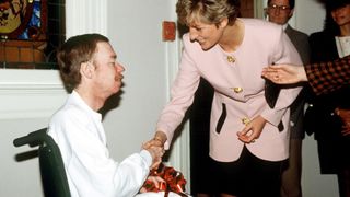 32 of the best Princess Diana Quotes - Diana shaking the hand of an AIDS patient