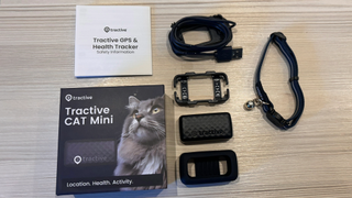 Everything included in the Tractive Mini GPS Cat Tracker: collar, instructions, box, charger, mount