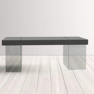 Minimalist glass base dining table.