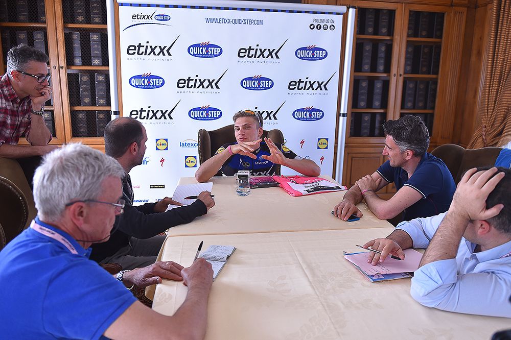 Overall race leader Marcel Kittel talks with reporters during the first rest day of the 2016 Giro d'Italia