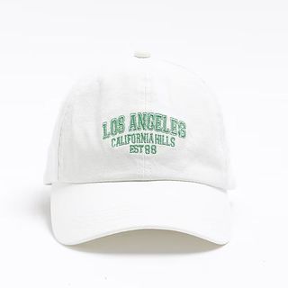 white baseball cap with embroidery of Los Angeles