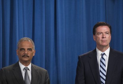 Eric Holder and James Comey.