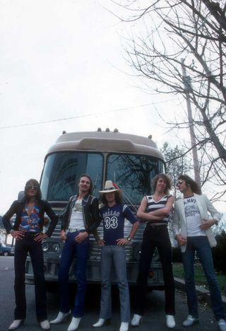 Scorpions pose in front of their tourbus