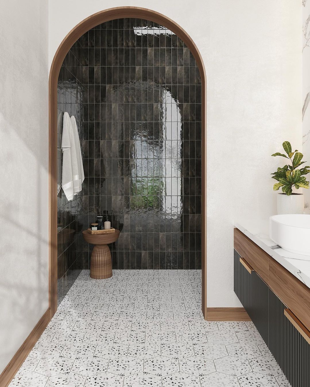 Gray tile in arch in bathroom
