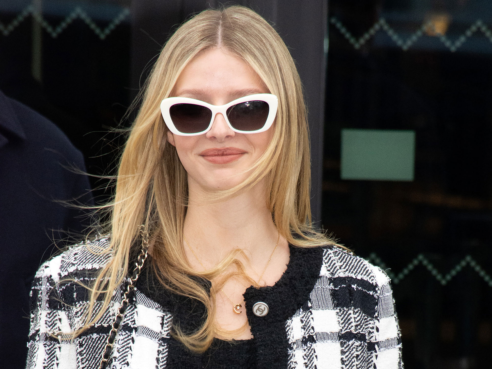 Apple Martin wears white sunglasses