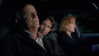 Clyde Bruckman, Mulder, and Scully in the "Clyde Bruckman's Final Repose" episode of The X-Files