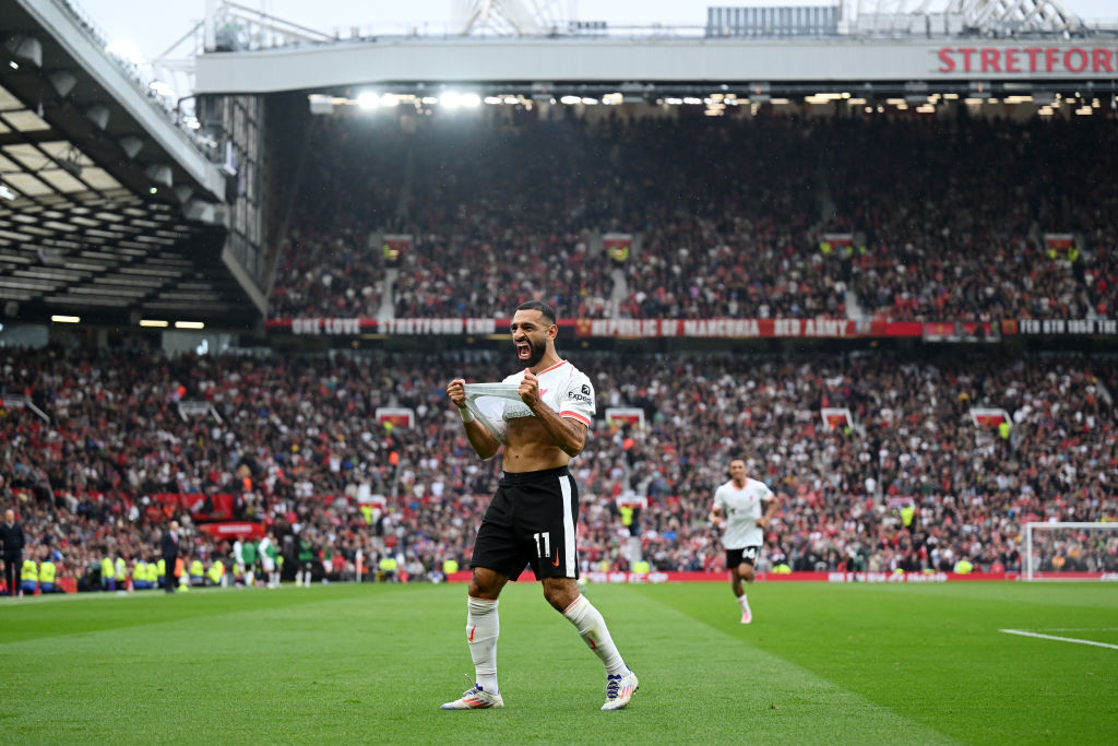 Mohamed Salah of Liverpool celebrates scoring his team's third goal during the Premier League match between Manchester United FC and Liverpool FC at Old Trafford on September 01, 2024 in Manchester, England.