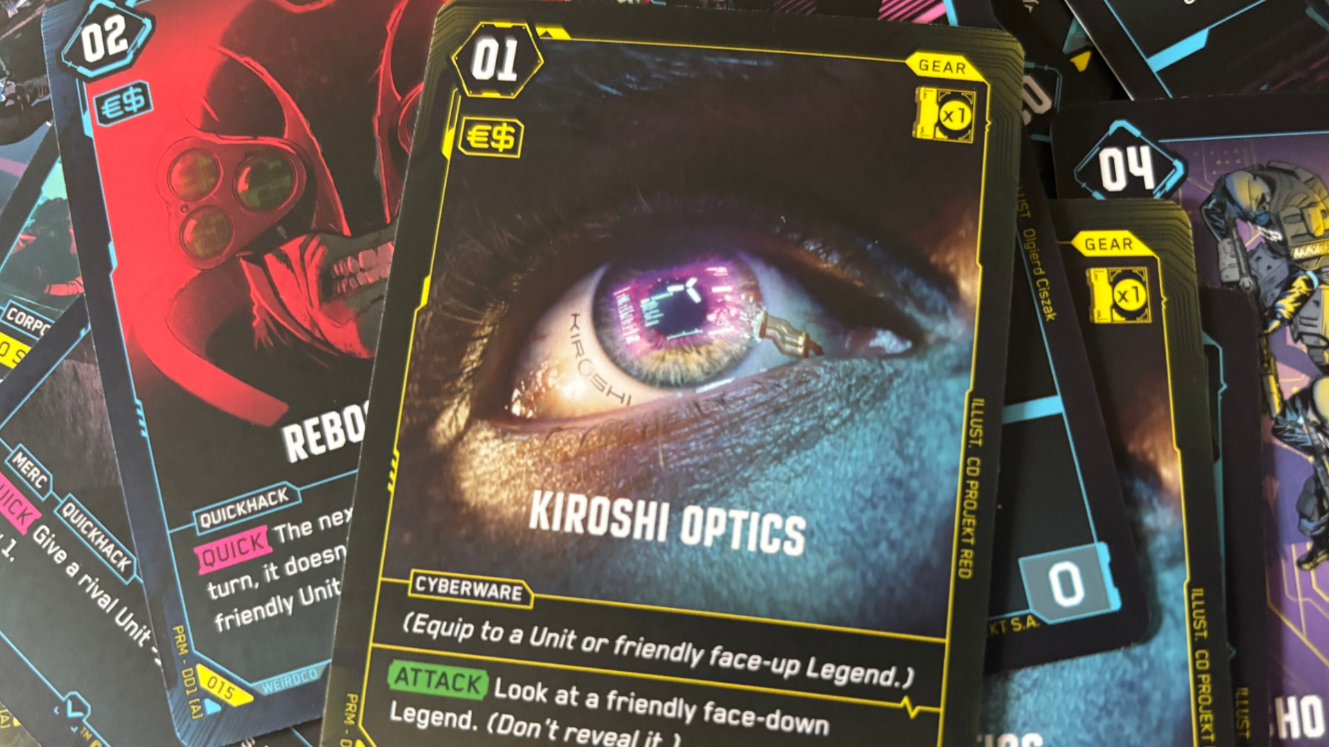 Cyberpunk TCG cards arranged on top of one another