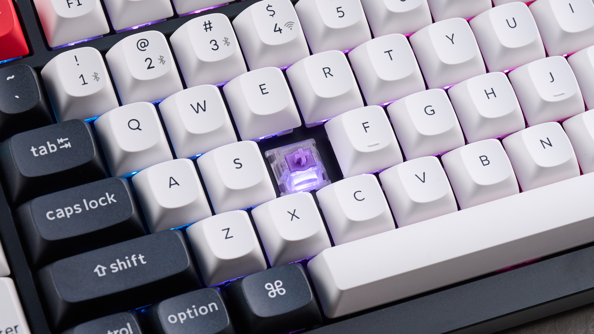 A black, white and red Keychron Q12 HE gaming keyboard with Hall Effect switches