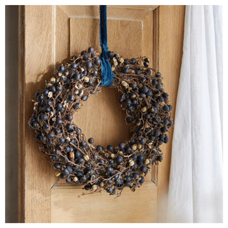 A preserved nightshade berry wreath from Anthropologie