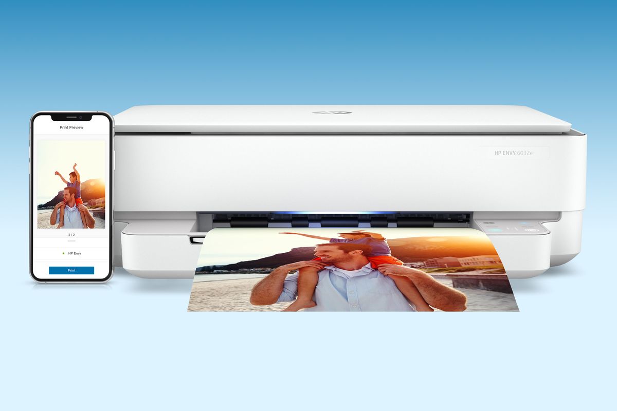 HP Envy 6032e printer on a blue background