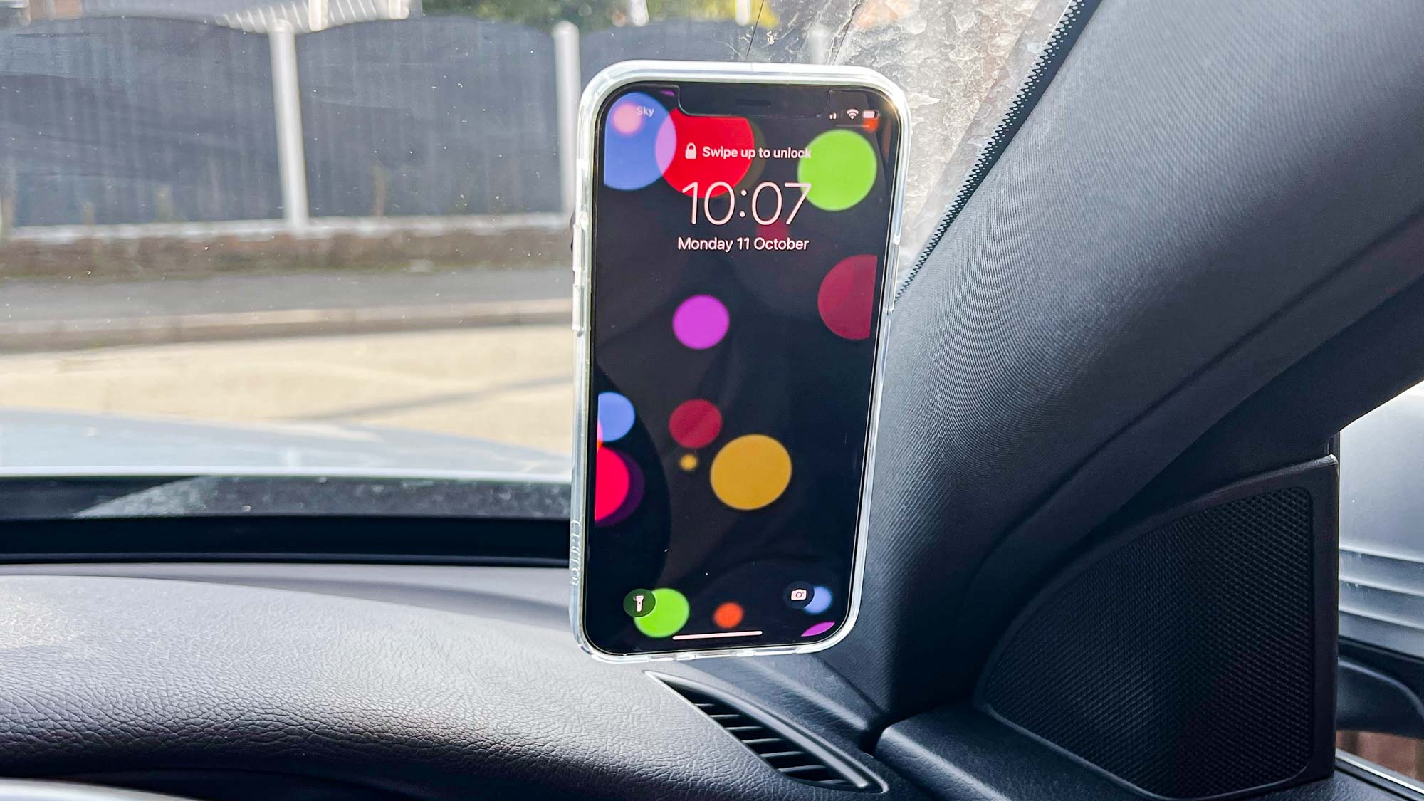 Popsockets PopMount 2 mounted to windshield with cell phone