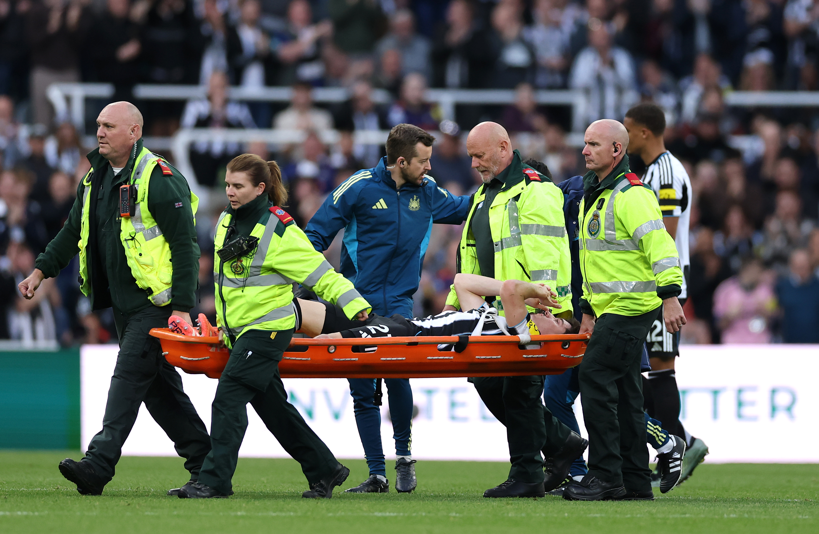 Tino Livramento is stretchered from the field