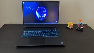Alienware M18 gaming laptop on a black desk