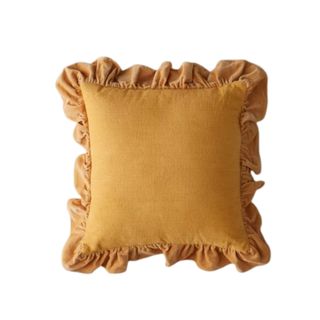 A square orange throw pillow with ruffled edges