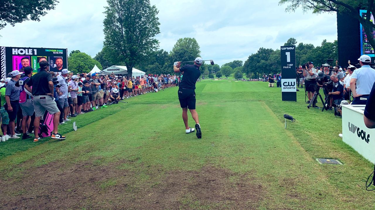 Dustin Johnson tees off the 1st hole at the LIV Golf Tulsa event