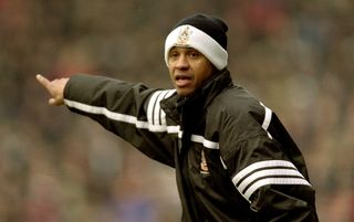 Fulham's Jean Tigana giving instructions from the touchline