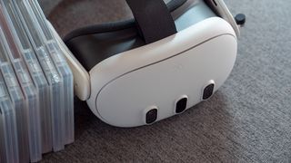 A Meta Quest 3 headset alongside physical game cases